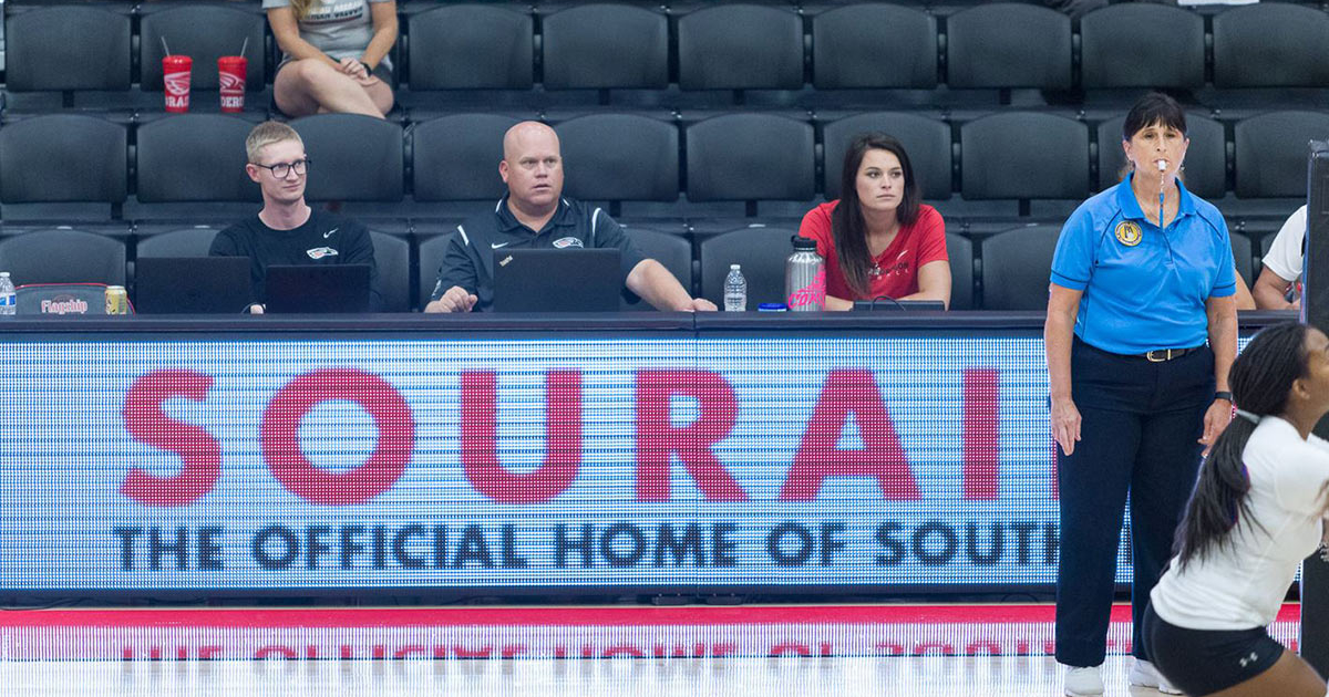 SOU's McDermott (left) is the CCC's Sports Information Director of the Year