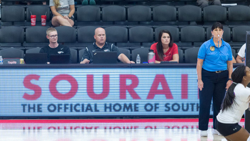 SOU's McDermott (left) is the CCC's Sports Information Director of the Year